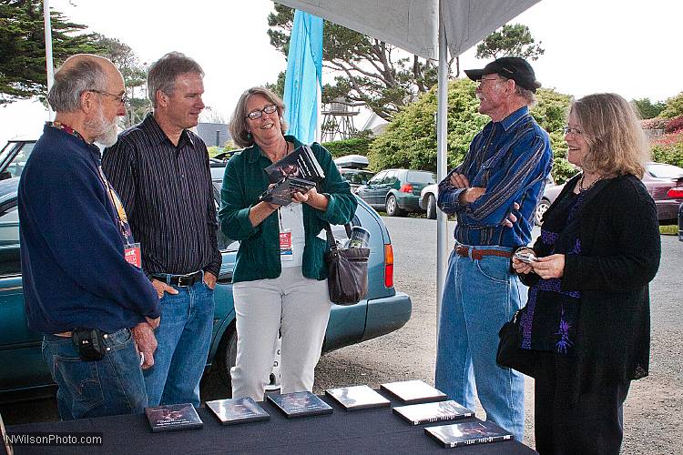 Filmmakers Les Blank, Chris Simon and Maureen Gosling at the DVD table at Crown Hall.