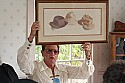 Film lighting expert Richmond "Aggie" Aguilar shows a print he received from Henry Fonda at the inaugural Mendocino Film Festival