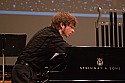 Julian Pollack plucks the piano strings by hand as directed by composer George Crumb