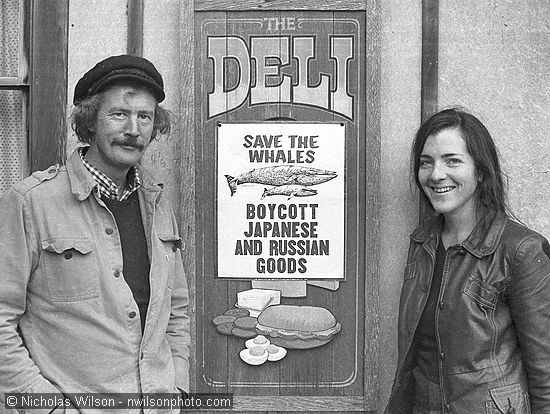 Jim and Brenda Coupe, former owners of the Mendocino Deli on Main St., supported the Mendocino Whale War's save-the-whales campaign in 1976.<br /><br />Negative 2-9-76-23. Scanned from 35 mm neg  at 2700 dpi with Nikon LS-2000 on 2/19/01.