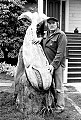 Byrd Baker poses with his driftwood whale sculpture in front of Mendocino's MacCallum House Inn. Baker championed the cause of stopping commercial whaling when he helped organize the Mendocino Whale War in 1976.