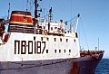 The Aleksandrovsk, one of over a dozen 300 ft. Russian trawlers off the California coast just outside the 12 mile limit. Note the hammer and sickle emblem of the Soviet Union and the ship's officers on ther bridge observing us through binoculars.