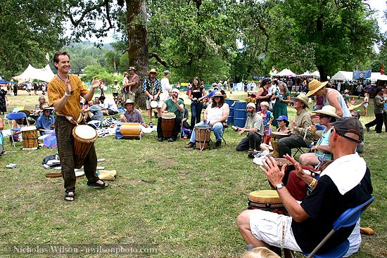 Kim Atkinson leads the drum circle