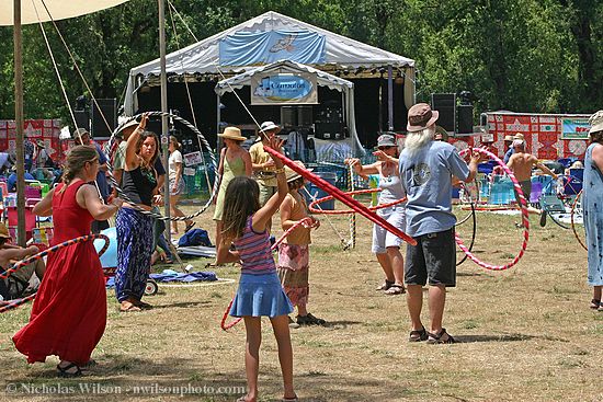 Hula hooping in back of the concert meadow