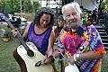 Wavy Gravy adds his signature to a guitar raffled for a charity benefit during the Kate Wolf Music Festival 2005.