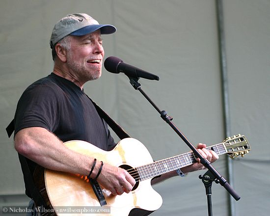 John McCutcheon sings and plays guitar Friday evening.