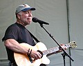 John McCutcheon sings and plays guitar Friday evening.