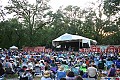 Audience in the concert meadow Friday evening as John McCutcheon performs on the main stage