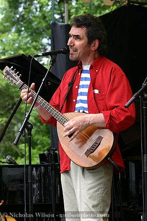 Jez Lowe plays a mandolin-type instrument, a mandola or cittern