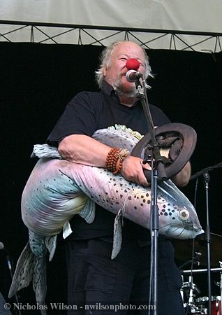 Wavy Gravy with a fishy friend on the main stage