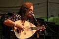 David Lindley plays an electric solid body oud, one of his large collection of instruments