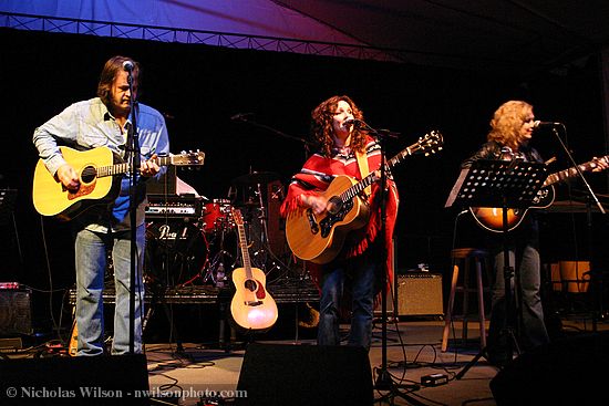 The Sisters Morales perform in the Kate Wolf song set with their lead guitar player David Spencer