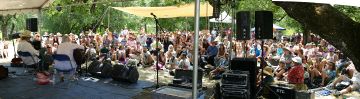 Panoramic view of the Arlo Hagler Memorial Stage with Rosalie Sorrels and Garnet Rogers performing