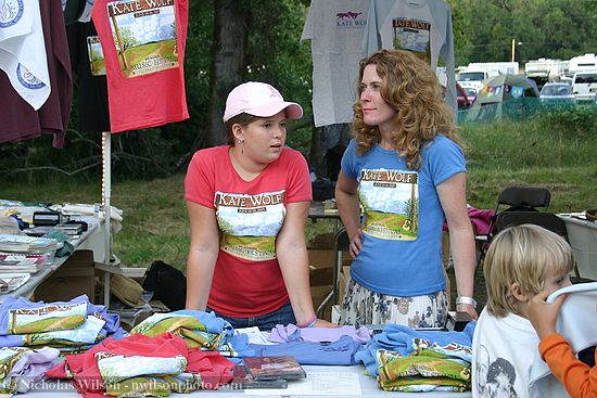 Kate Wolf family members tend their booth