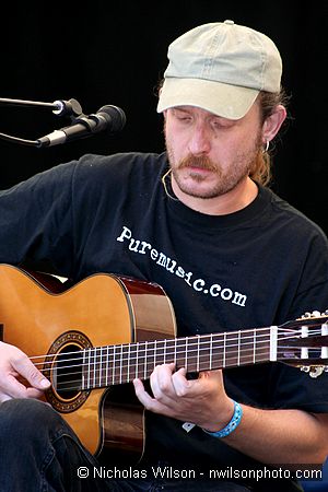 Thomm Jutz plays guitar with Mary Gauthier