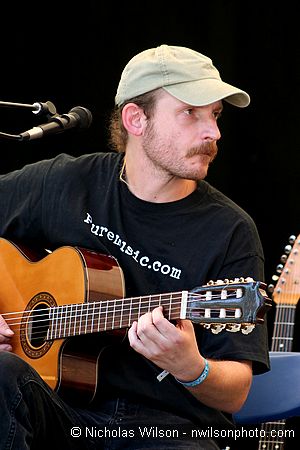 Thomm Jutz plays guitar with Mary Gauthier