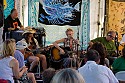 Eliza Gilkyson sings one at the Songwriter's Circle at the Revival Tent