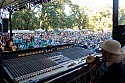 Wavy Gravy watches Hot Tuna from the sound board