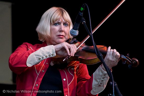 Barbara Lamb on fiddle with Laura Love Band