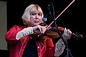 Barbara Lamb on fiddle with Laura Love Band