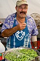 John Wilson samples a sugar pea in the backstage kitchen