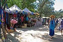 Hat vendor booth at the creekside entrance to the concert bowl