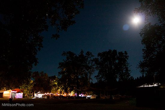 Moonlit view of the late night scene at the People's stage and beer garden.
