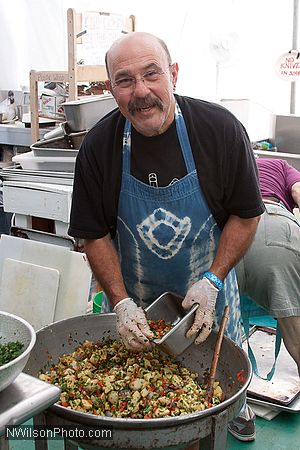 John Wilson cooking up some tater salad in the backstage kitchen