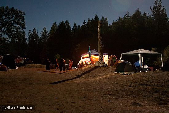 Riverside campground by the light of the full moon