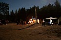 Riverside campground by the light of the full moon