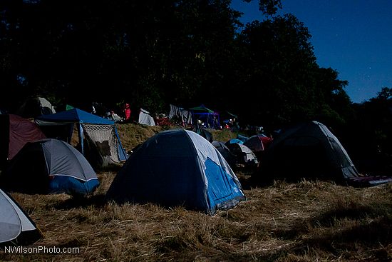 Riverside campground by the light of the full moon