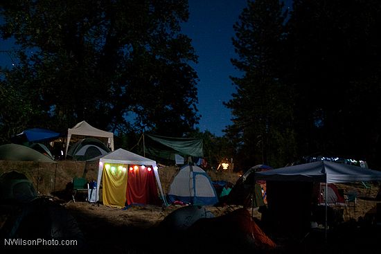 Riverside campground by the light of the full moon