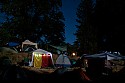 Riverside campground by the light of the full moon