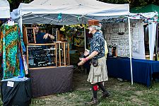 Vendors at the main concert bowl. This dude is wearing a cargo kilt!