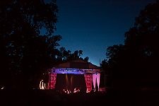 The Main stage against a twilight sky at 9:30 PM Saturday night.