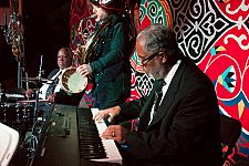 Rickie Monie, piano, Ben Jaffe, tuba, and Joseph Lastie, Jr. drums