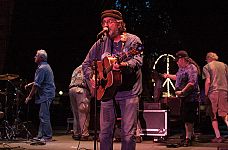 Singer/songwriter Jim Page did a 'tweener set Sunday night as the stage crew sets up for Nitty Gritty Dirt Band