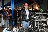 Matt Rowland runs the sound system and lights for the opening reception. Matt also provided the tent, staging, furnishings and equipment at many of the MFF venues.