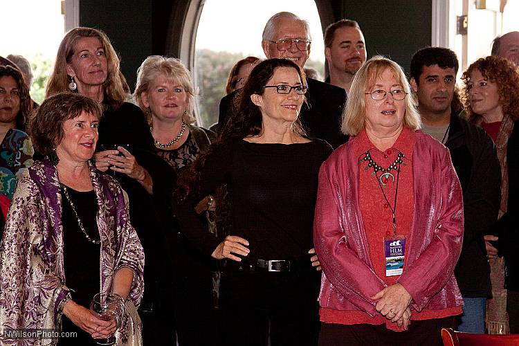 Toni Orans, left, Betsy Ford and Pat Ferrero (wearing glasses) among the happy throng at the opening party.