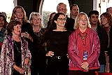 Toni Orans, left, Betsy Ford and Pat Ferrero (wearing glasses) among the happy throng at the opening party.
