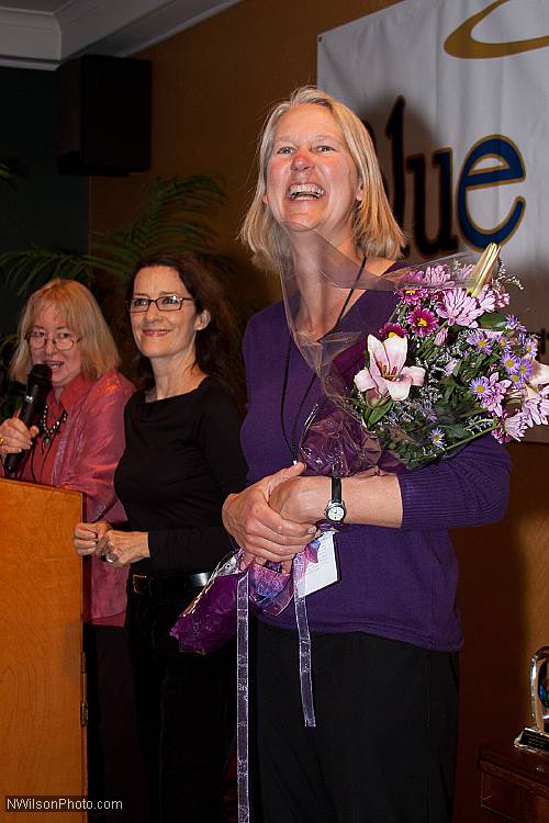 Mendocino Film Festival vice president Ann Walker with bouquet presented at the opening reception by Program Director Pat Ferrero and MFF vice president Betsy Ford.