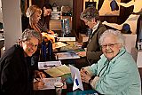 Folk singer/storyteller Ronnie Gilbert gets her tickets from Arlene Moorehead at the Mendocino Film Festival box office