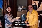 Retired lighting director and Mendocino Resident Rich Aguilar gets his film tickets from Maureen Leahy at the MFF box office.