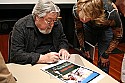 Cinematographer Laszlo Kovacs signs a rare Easy Rider movie poster at the inaugural Mendocino Film Festival in 2006.