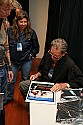 Gaffer Rich Aguilar autographs an Easy Rider poster at the inaugural Mendocino Film Festival in 2006.