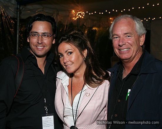 Photographer Robert Stewart and videographer Mike Evans with a pretty lady at the Opening Reception Thursday May 17, 2007.