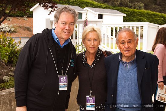 Advisor to the festival board Jim McCullough joins festival sponsor and Blue Angel vodka owner Maurice Kanbar and his escort.