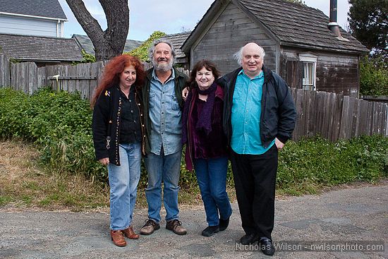 Traditional musicians Eric and Suzy Thompson, Jody Stecher and Kate Brislin outside Crown Hall.