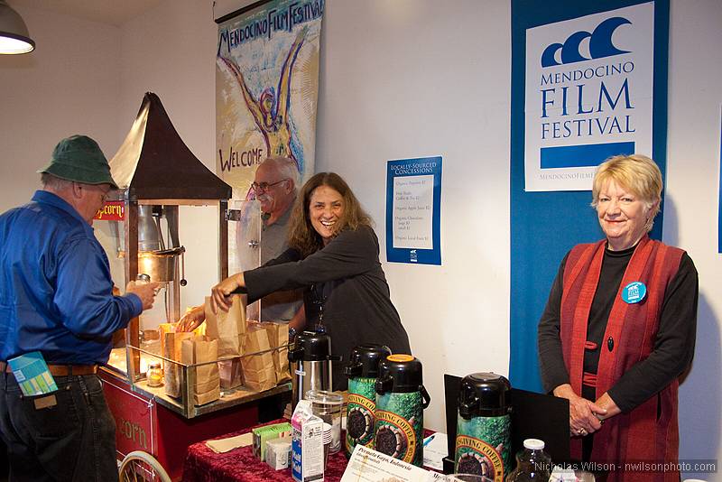 Volunteers serve up popcorn, coffee, juice and cookies at Matheson Center.