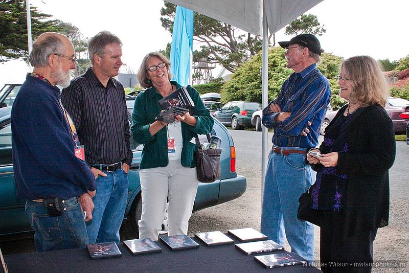 Filmmakers Les Blank, Chris Simon and Maureen Gosling at the DVD table at Crown Hall.